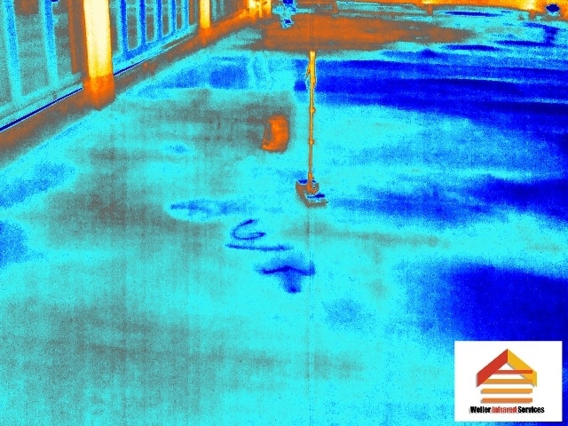 Infrared thermal scan of commercial flat roof revealing moisture intrusion and wet insulation patterns - Weller Infrared Services Florida