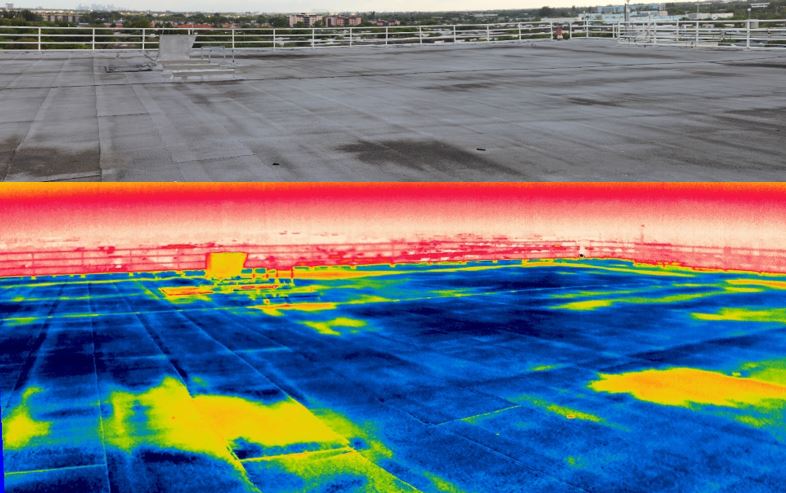 Side-by-side roof infrared moisture survey showing wet insulation beneath flat roof membrane - commercial building Florida